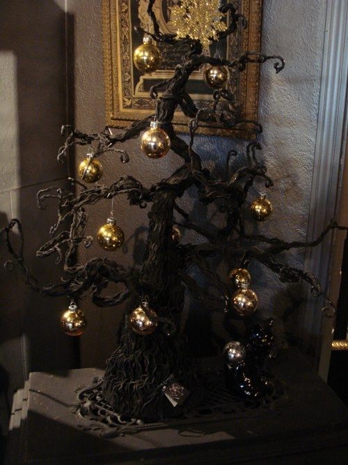 06-gothic-black-christmas-tree-with-gold-ornaments-for-a-spooky-holiday