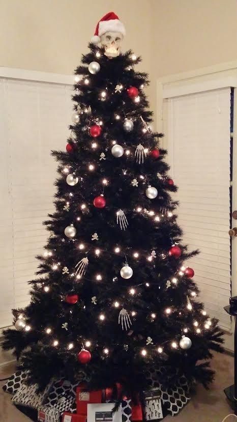 07-nightmare-before-christmas-inspired-black-tree-with-lights-red-and-silver-ornaments-and-skeleton-hands