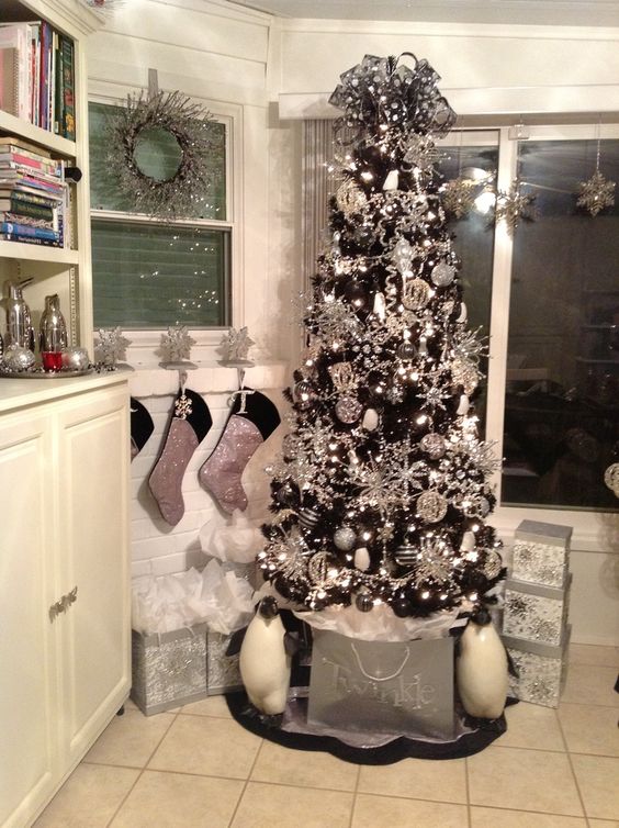 10-a-black-tree-covered-with-silver-ornaments-all-over-for-a-bold-glam-look