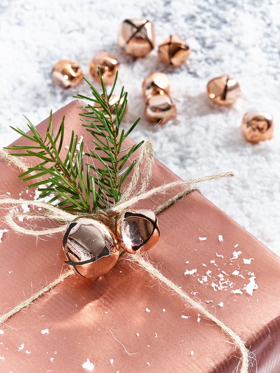 24-copper-gift-wrapping-and-jingle-bells-and-evergreen-sprigs-for-decor