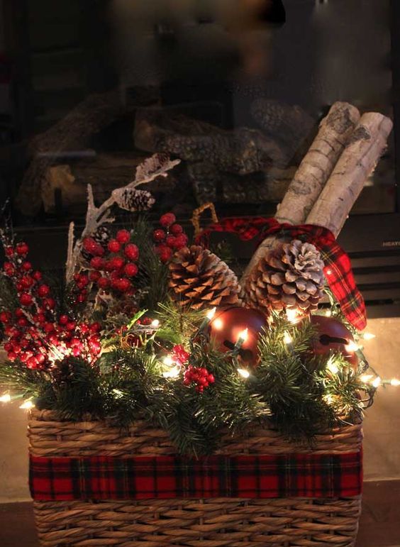 21-a-basket-with-evergreens-berries-pinecones-and-lights